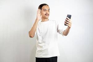 Asian man with various expressions while holding mobile phone. isolated in white background photo