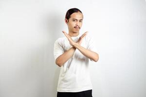 Young man wearing a white t-shirt. make movements not with your hands. crossed arms. There isn't any. sign isolated on white background photo