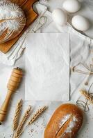 White sheet of paper on the table with pastries. Cooking mockup photo