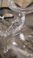 Close-up of crystal glassware with intricate patterns, arranged on a table video