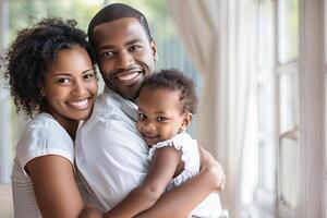close-up portrait of a happy family with a small child in white T-shirts at home in a large bright room photo