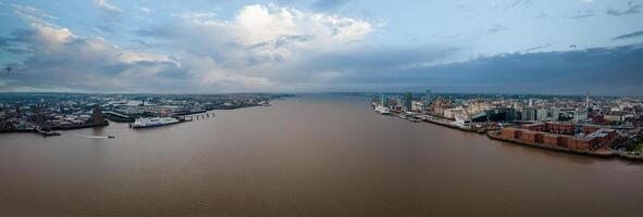 Liverpool, Merseyside, England September 20th, 2021 Aerial view of Liverpool Skyline and the Mersey river. Waterfront in the evening. photo