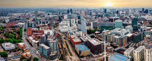 Aerial drone view of Manchester city in UK on a beautiful sunny day. photo