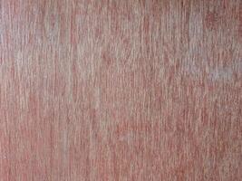 The wood grain pattern is clearly visible, with vertical lines and variations in brown from light to dark. photo