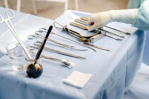 Medical instruments for surgery on table photo