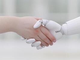 Human Hand Shaking with Robot Hand Symbolizing Technology Partnership, Innovation, and Future Connection photo