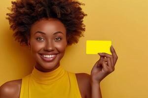Smiling Woman Holding Yellow Card Posing Against Solid Yellow Background, Vibrant Color Elements, Advertising, Promotional Material, Happy Expression, Close-Up Portrait photo