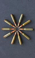 Rifle Bullets In Round Order Closeup View. Stock Photo For Military Vertical Story