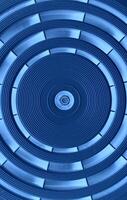 Perfect round rings divided into equal sectors in dark blue design. Stock image for abstract vertical background photo