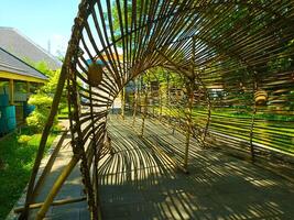 a bamboo structure with a large hole in the middle photo