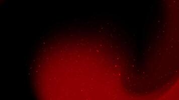 Red and black background with scattered dots. video