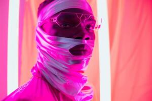 Handsome Male Model in Bandana with Neon pink Showcased in a Modern Lifestyle portrait Background photo