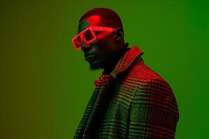 Fashion Model in Trendy Overcoat with Neon Red Sneaker Mask and Neon Green Background Featuring Stylish and Sophisticated Lifestyle portrait photo
