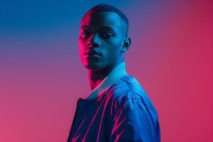 Trendsetting male model in a casual bomber jacket with a neon blue background merging relaxed fashion with bold neon colors for a stylish and eye catching look photo