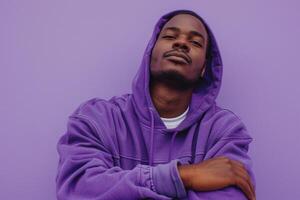 Trendy Cozy Hoodie Model in Soft Lavender Background Seated Lifestyle portrait with Modern and Comfortable Style photo