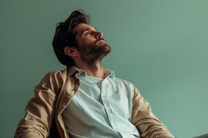 Fashion Model in Relaxed Button Down with Soft Green Background portrait Featuring Fashion and Laid Back Light photo