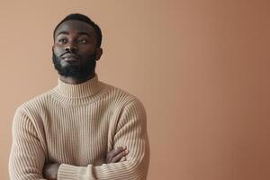Trendy Fashion Model in Comfortable Sweater Soft Beige Background Relaxed portrait Stylish and Cozy Males Wear photo
