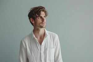 Fashionable white shirt portrait Model with a soft grey background showcasing a minimalist approach and high fashion style photo