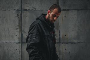 Trendy Model in Urban Jacket in Concrete Grey Modern Lifestyle portrait with Stylish Background photo