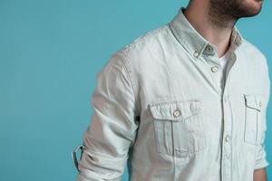 Handsome male model in light blue casual button down fashionable portrait relaxed modern style photo