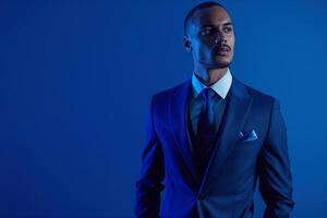 Sophisticated male model in a tailored suit with royal blue cloth showcased in a costume fashion portrait with a luxurious lifestyle angle photo