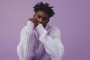 Chic male model in a sweater with a soft lilac background contemporary portrait highlighting modern Males fashion and stylish sweater choices photo