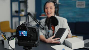 Tech vlogger doing unpacking review of mobile phone while presenting specifications to public. Social media influencer unboxing touchscreen smartphone while doing recommendation . video