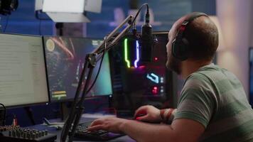 Nevous streamer losing videogame, game over for man cyber playing online space shooter games with headset. Player performing on powerful computer talking with players on chat in gaming competition video