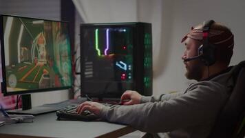 Angry pro gamer playing space shooter games and losing using RGB powerful computer. Gamer over of mock-up game player, performing in cyber room virtual game in cyberspace, gaming tournament video