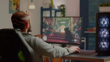 Nervous woman screaming at husband while he is playing space shooter videogame on RGB powerful computer and streaming online competition. Pro cyber with headset performing during virtual tournament video
