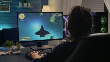 Competitive player losing e-sport championship using technology network wireless. Defeated woman playing online space shooter competition with powerful professional computer video