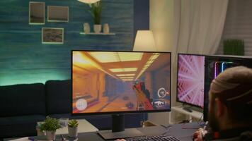 Girlfriend shuts down pro gamer computer during first person tournament in gaming home studio. Cyber player streaming online games using powerful RGB system desktop in room with neon light video