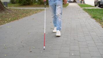 Close-up of a blind man with a walking stick video