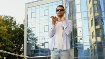 Blind man using voice control app in smartphone, innovations video