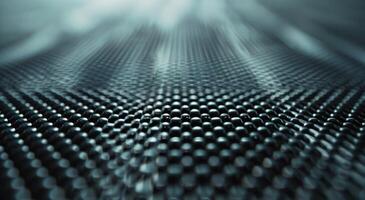 Textured Black Fabric With White Dots Under Soft Lighting photo