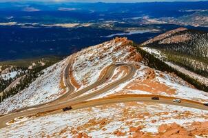 Winding road, serpentine in the mountains up to the Pikes Peak Mountain, Colorado, US photo