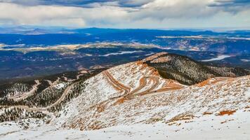 Winding road, serpentine in the mountains up to the Pikes Peak Mountain, Colorado, US photo