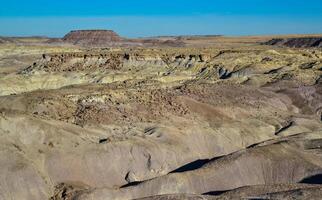 Landscape and panorama of erosive multi-colored clay in Petrified Forest National Park, Arizona photo