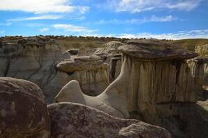 Weird sandstone formations created by erosion at Ah-Shi-Sle-Pah Wilderness Study Area in San Juan County near the city of Farmington, New Mexico. photo