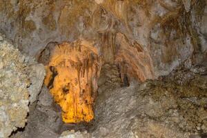 Calcite inlets, stalactites and stalagmites in large underground halls in Carlsbad Caverns National Park, New Mexico. USA photo