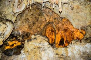 Calcite inlets, stalactites and stalagmites in large underground halls in Carlsbad Caverns National Park, New Mexico. USA photo