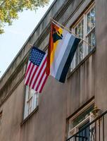 SAVANNAH, USA - DECEMBER 02, 2011 An American flag in the window of a building in Savannah photo