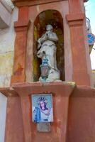 GOZO, MALTA - SEPTEMBER 14, 2012 ancient statue of the virgin in the interior of a residential building, Gozo, Malta photo