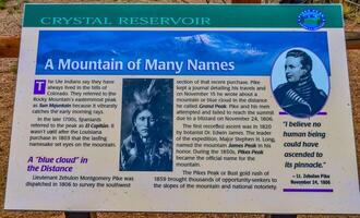 Colorado, USA - MAY 05, 2018 - information sign on the snowy slope of the Pikes Peak Mountains, Colorado, US photo