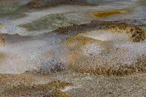 Boiling water bubbler Geyser. Active geyser with major eruptions. Yellowstone NP, Wyoming, US photo