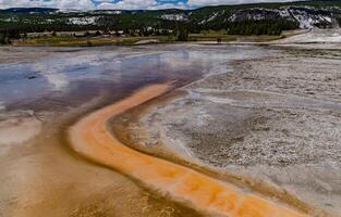 Algae-bacterial mats. Hot thermal spring, hot pool in the Yellowstone NP photo