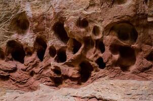 Eroded by water and wind cliffs in the canyon. Little Wild Horse Canyon. San Rafael Swell, Utah photo