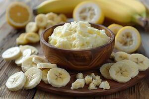 Mashed Banana with Sliced and Diced Banana on Wooden Board photo