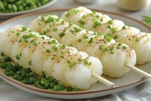 Grilled Mochi Skewers with Green Onions and Sesame Seeds photo