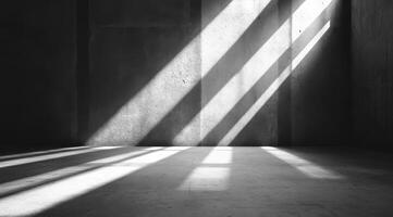 This minimalist concrete space balances light and shadow, perfect for product showcases, creative presentations, and artistic displays, offering ample room for engaging text and stunning visuals photo